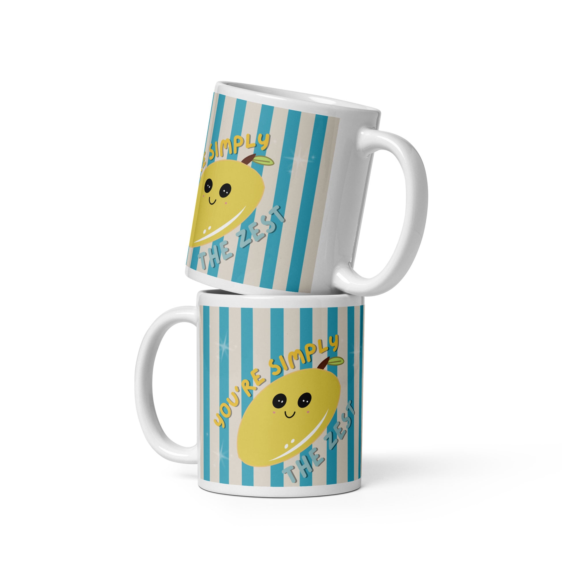 Cute white ceramic mug with blue vertical stripes and a smiling yellow lemon illustration featuring the phrase “You’re Simply The Zest”. Perfect for summer coffee, tea and cosy desk setups.